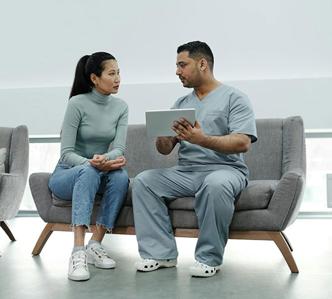 A live-in aide interviews a family member of a patient in La Plata, MD