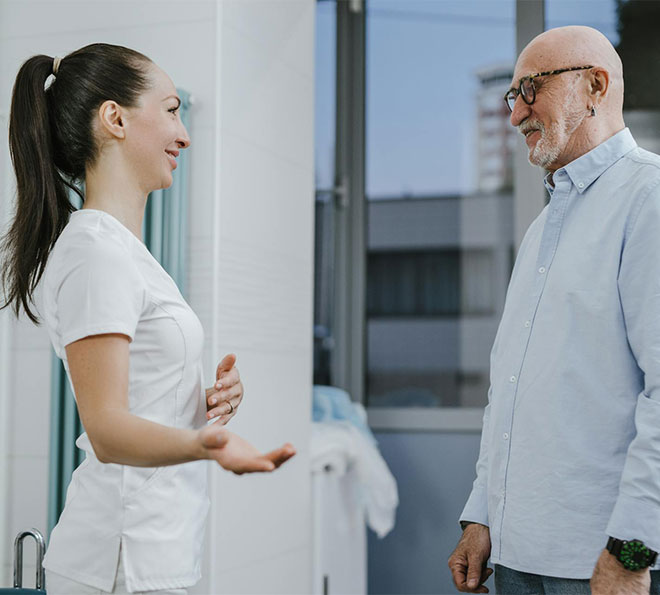 A nurse directs her patient with dementia in Waldorf, MD